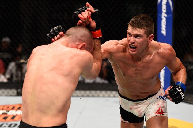 OTTAWA, ON - JUNE 18:   (R-L) Stephen Thompson of the United States punches Rory MacDonald of Canada in their welterweight bout during the UFC Fight Night event inside the TD Place Arena on June 18, 2016 in Ottawa, Ontario, Canada. (Photo by Jeff Bottari/Zuffa LLC/Zuffa LLC via Getty Images)