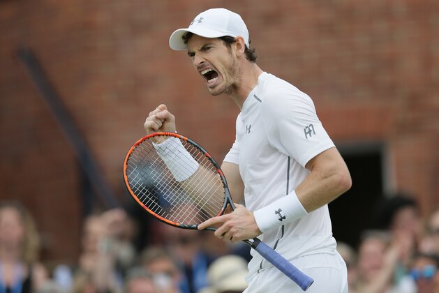 Britain's Andy Murray shouts after winning a point against Canada's Milos Raconic during their final tennis match on the seventh day of the Queen's Championships London, England, Sunday June 19, 2016. (AP Photo/Tim Ireland)