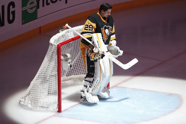 Pittsburgh Penguins goalie Marc-Andre Fleury stands in the goal before the start of Game 5 of the NHL hockey Stanley Cup Eastern Conference finals against the Tampa Bay Lightning, Sunday, May 22, 2016, in Pittsburgh. (AP Photo/Gene J. Puskar)