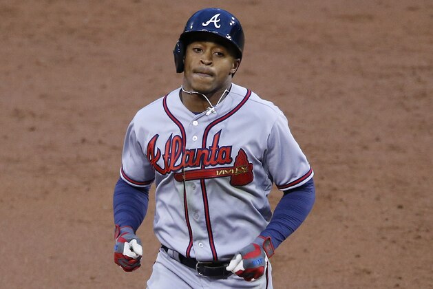 Atlanta Braves' Mallex Smith rounds third after hitting a two-run home run off Pittsburgh Pirates starting pitcher Juan Nicasio during the third inning of a baseball game in Pittsburgh, Tuesday, May 17, 2016. (AP Photo/Gene J. Puskar)