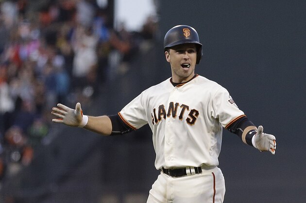San Francisco Giants' Buster Posey celebrates after making the game winning hit against the Los Angeles Dodgers in the tenth inning of a baseball game Saturday, June 11, 2016, in San Francisco. The Giants won 5-4. (AP Photo/Ben Margot)