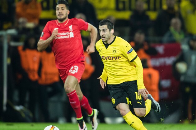 Dortmund's Armenian midfielder Henrikh Mkhitaryan runs with the ball during the UEFA Europe League quarter-final, first-leg football match Borussia Dortmund vs Liverpool FC in Dortmund, western Germany on April 7, 2016.
The match ended with a 1-1 draw. / AFP / ODD ANDERSEN        (Photo credit should read ODD ANDERSEN/AFP/Getty Images)