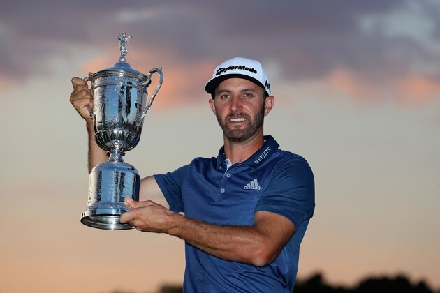 OAKMONT, PA - JUNE 19:  Dustin Johnson of the United States poses with the winner's trophy after winning the U.S. Open at Oakmont Country Club on June 19, 2016 in Oakmont, Pennsylvania.  (Photo by Andrew Redington/Getty Images)