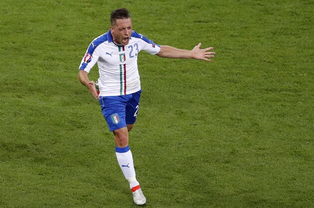 Italy's Emanuele Giaccherini celebrates after scoring his side's first goal during the Euro 2016 Group E soccer match between Belgium and Italy at the Grand Stade in Decines-Charpieu, near Lyon, France, Monday, June 13, 2016. (AP Photo/Michael Sohn)