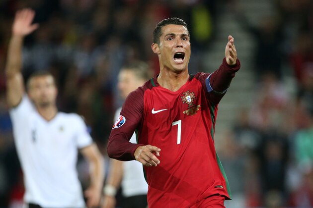 PARIS, FRANCE - JUNE 18: Cristiano Ronaldo of Portugal reacts during the UEFA EURO 2016 Group F match between Portugal and Austria at Parc des Princes on June 18, 2016 in Paris, France. (Photo by Jean Catuffe/Getty Images)