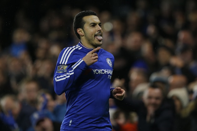 Chelsea's Pedro celebrates scoring his side's second goal during the English Premier League soccer match between Chelsea and Newcastle United at Stamford Bridge stadium in London, Saturday, Feb. 13, 2016.  (AP Photo/Matt Dunham)