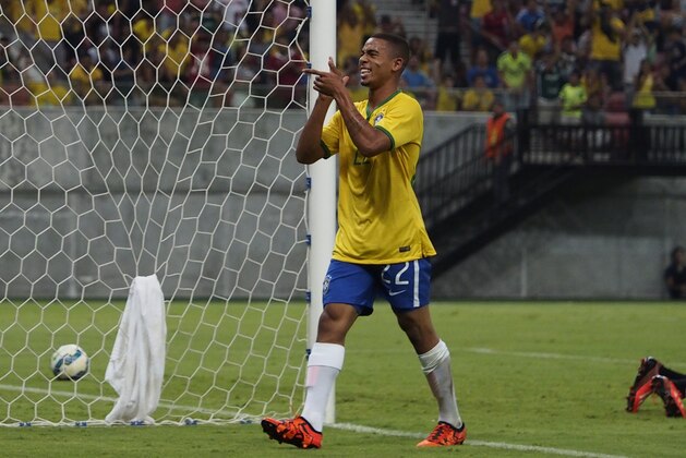 Brazil's Olympic striker Gabriel Jesus celebrates after scoring against Haiti during a friendly match at the Arena Amazonia in Manaus, Amazonas State, Brazil, on October 12, 2015. ?The match works as a preparation for Brazils under 23 team and for testing security, healthcare, volunteering, urban mobility and traffic around the Arena Amazonia, as Manaus will host six football matches during the Olympic Games next year.  AFP PHOTO / RAPHAEL ALVES        (Photo credit should read RAPHAEL ALVES/AFP/Getty Images)