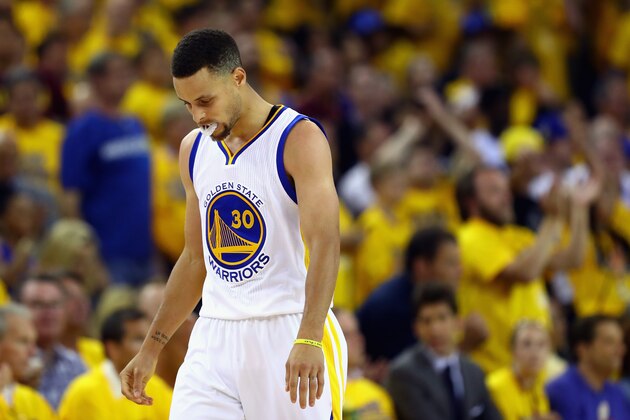 OAKLAND, CA - JUNE 19:  Stephen Curry #30 of the Golden State Warriors reacts during the second half against the Cleveland Cavaliers in Game 7 of the 2016 NBA Finals at ORACLE Arena on June 19, 2016 in Oakland, California. NOTE TO USER: User expressly acknowledges and agrees that, by downloading and or using this photograph, User is consenting to the terms and conditions of the Getty Images License Agreement.  (Photo by Ezra Shaw/Getty Images)