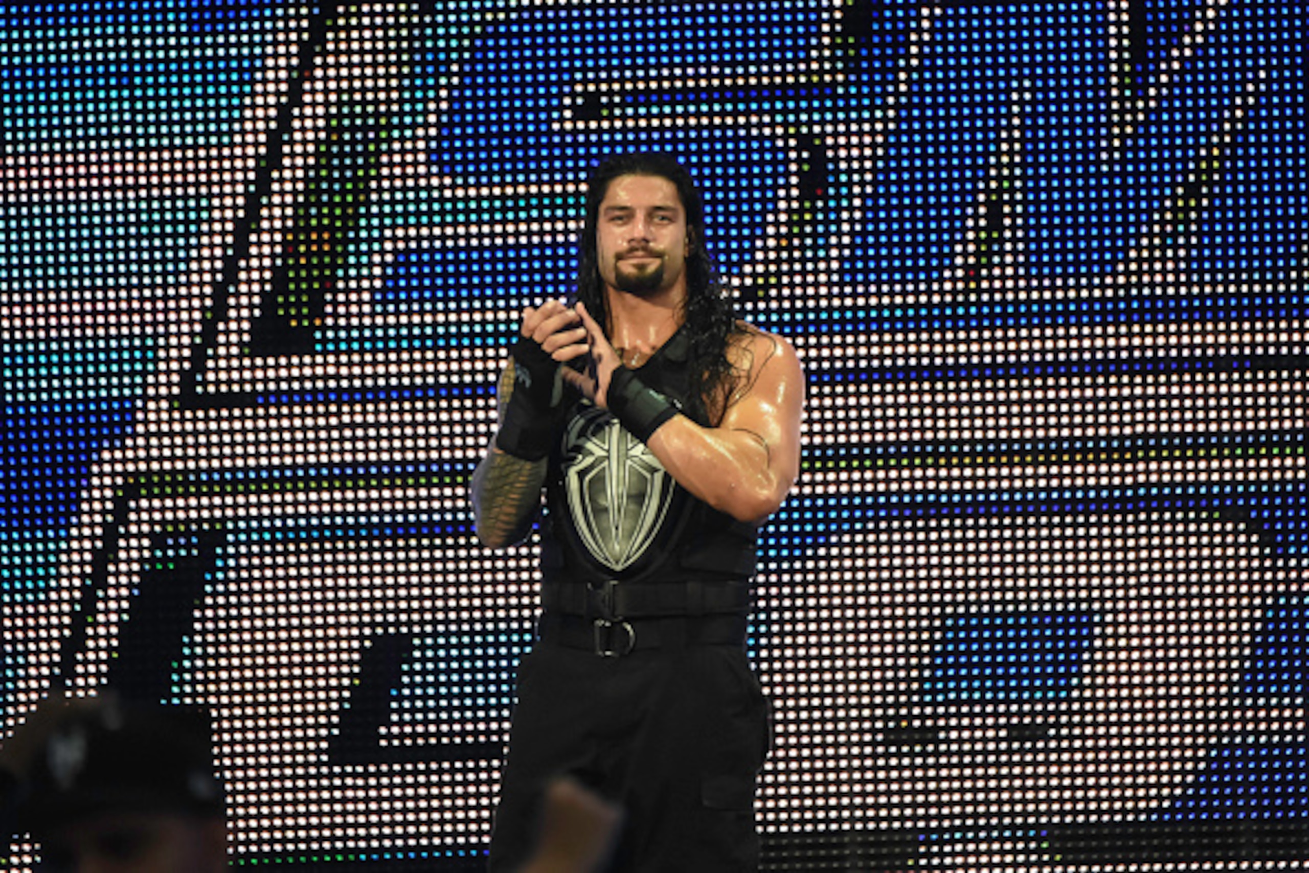 MIAMI, FL- SEPTEMBER 01: Roman Reigns looks on during the WWE Smackdown on September 1, 2015 at the American Airlines Arena in Miami, Florida.  (Photo by Ron ElkmanSports Imagery/Getty Images)