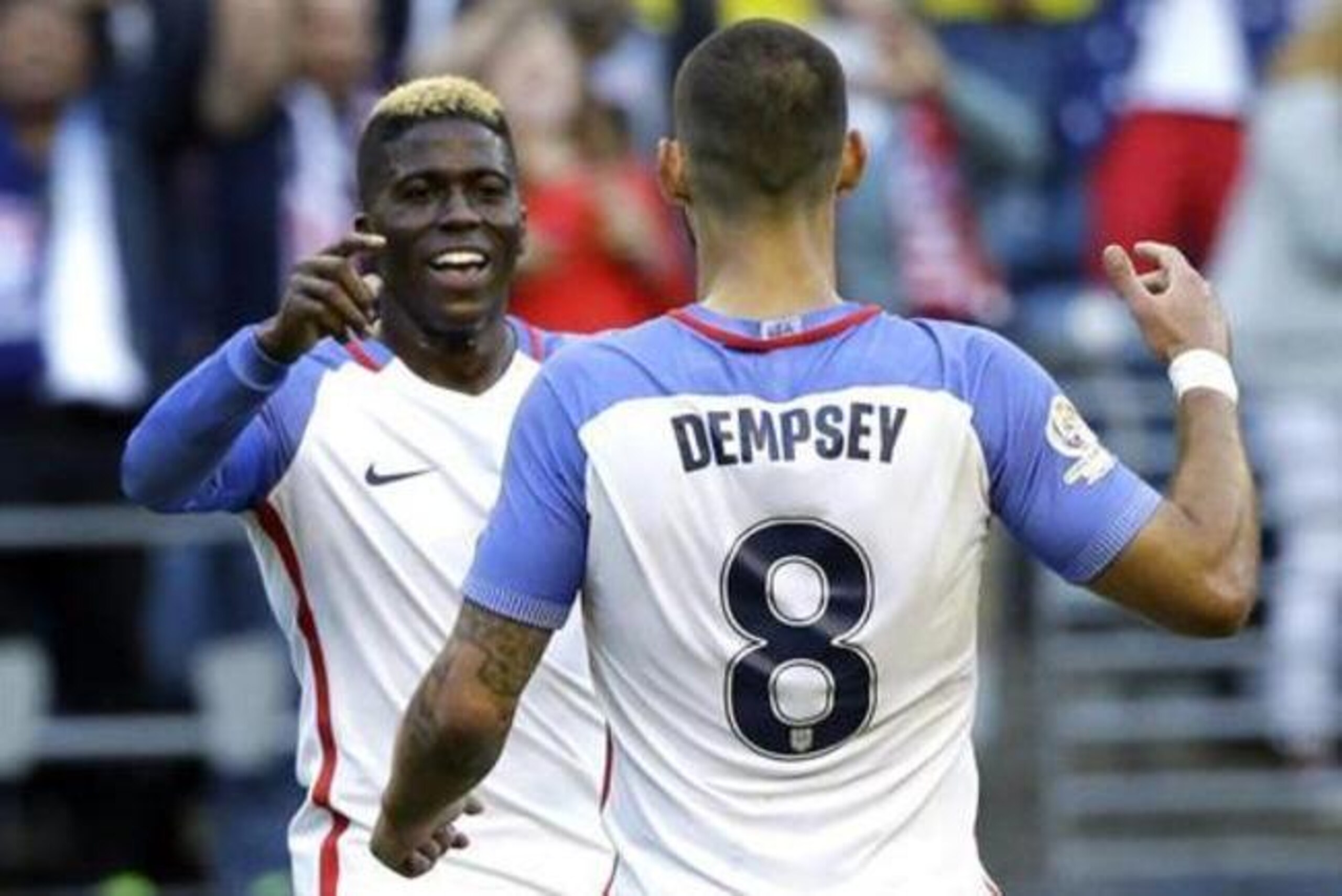 United States' Gyasi Zardes, left, is greeted by Clint Dempsey, 8, after Zardes scored a goal against Ecuador in the second half of a Copa America Centenario quarterfinal soccer match, Thursday, June 16, 2016 at CenturyLink Field in Seattle. The United States beat Ecuador 2-1. (AP Photo/Ted S. Warren)