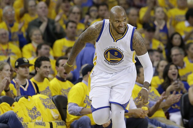 Golden State Warriors forward Marreese Speights (5) reacts after scoring against the Oklahoma City Thunder during the first half of Game 2 of the NBA basketball Western Conference finals in Oakland, Calif., Wednesday, May 18, 2016. (AP Photo/Marcio Jose Sanchez)