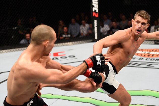 OTTAWA, ON - JUNE 18:   (R-L) Stephen Thompson of the United States kicks Rory MacDonald of Canada in their welterweight bout during the UFC Fight Night event inside the TD Place Arena on June 18, 2016 in Ottawa, Ontario, Canada. (Photo by Jeff Bottari/Zuffa LLC/Zuffa LLC via Getty Images)