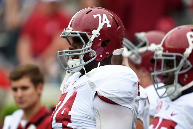 TUSCALOOSA, AL - APRIL 18:  Cam Robinson #74 of the White team watches action prior to the University of Alabama Crimson Tide A-day spring game at Bryant-Denny Stadium on April 18, 2015 in Tuscaloosa, Alabama.  (Photo by Stacy Revere/Getty Images)