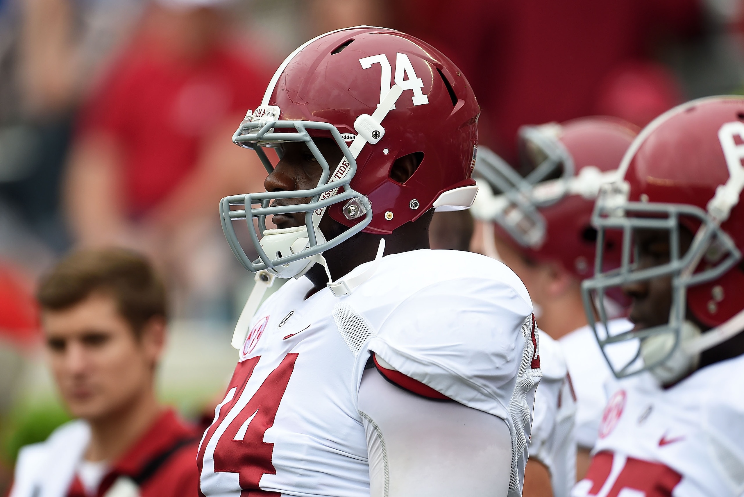 TUSCALOOSA, AL - APRIL 18:  Cam Robinson #74 of the White team watches action prior to the University of Alabama Crimson Tide A-day spring game at Bryant-Denny Stadium on April 18, 2015 in Tuscaloosa, Alabama.  (Photo by Stacy Revere/Getty Images)