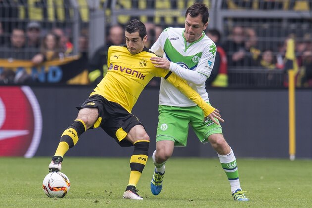 (L-R) Henrikh Mkhitaryan of Borussia Dortmund, Marcel Schï¿½ï¿½fer of VFL Wolfsburg during the Bundesliga match between Borussia Dortmund and VfL Wolfsburg on April 30, 2016 at the Signal Idun Park stadium in Dortmund, Germany.(Photo by VI Images via Getty Images)