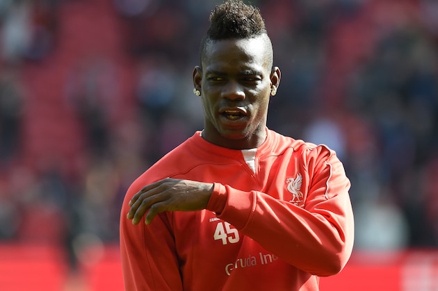 Liverpool's Italian striker Mario Balotelli warms up ahead of the English Premier League football match between Liverpool and Manchester United at Anfield in Liverpool, north west England on March 22, 2015. AFP PHOTO / PAUL ELLIS

RESTRICTED TO EDITORIAL USE. NO USE WITH UNAUTHORIZED AUDIO, VIDEO, DATA, FIXTURE LISTS, CLUB/LEAGUE LOGOS OR LIVE SERVICES. ONLINE IN-MATCH USE LIMITED TO 45 IMAGES, NO VIDEO EMULATION. NO USE IN BETTING, GAMES OR SINGLE CLUB/LEAGUE/PLAYER PUBLICATIONS.        (Photo credit should read PAUL ELLIS/AFP/Getty Images)
