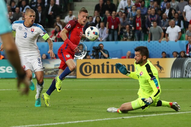SAINT-ETIENNE, FRANCE - JUNE 20:  Matus Kozacik of Slovakia saves the shot of Jamie Vardy of England during the UEFA EURO 2016 Group B match between Slovakia v England at Stade Geoffroy-Guichard on June 20, 2016 in Saint-Etienne, France. (Photo by Ian MacNicol/Getty Images)