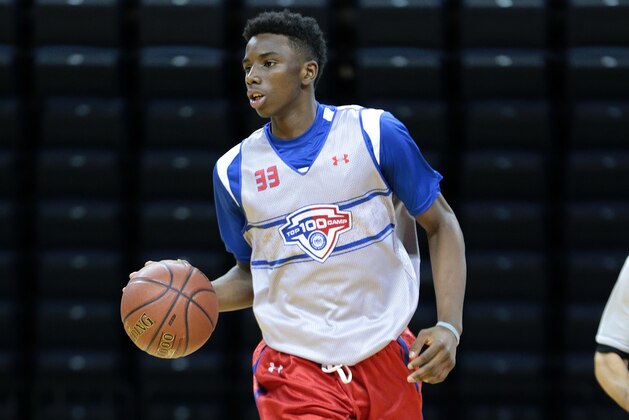 CHARLOTTESVILLE, VA - JUNE 19: Hamidou Diallo #33 in white brings the ball up the court during the NBPA Top 100 Camp on June 19, 2015 at John Paul Jones Arena in Charlottesville, Virginia. (Photo by Kelly Kline/Getty Images)