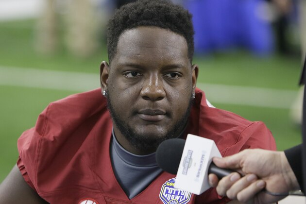 Alabama offensive lineman Cam Robinson (74) listens to a question during the media day for the NCAA Cotton Bowl college football game Tuesday, Dec. 29, 2015, in Arlington, Texas. (AP Photo/LM Otero)