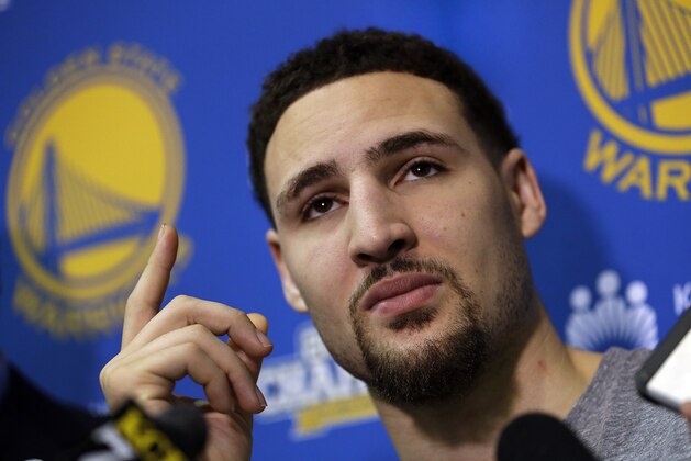 Golden State Warriors' Klay Thompson gestures during a news conference Monday, June 20, 2016, in Oakland, Calif. The Warriors lost to the Cleveland Cavaliers in Game 7 of basketball's NBA Finals on Sunday. (AP Photo/Ben Margot)