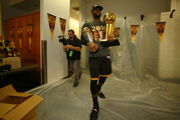 OAKLAND, CA - JUNE 19:  LeBron James #23 of the Cleveland Cavaliers celebrates after winning Game Seven of the 2016 NBA Finals against the Golden State Warriors on June 19, 2016 at Oracle Arena in Oakland, California. NOTE TO USER: User expressly acknowledges and agrees that, by downloading and or using this photograph, user is consenting to the terms and conditions of Getty Images License Agreement. Mandatory Copyright Notice: Copyright 2016 NBAE (Photo by Nathaniel S. Butler/NBAE via Getty Images)