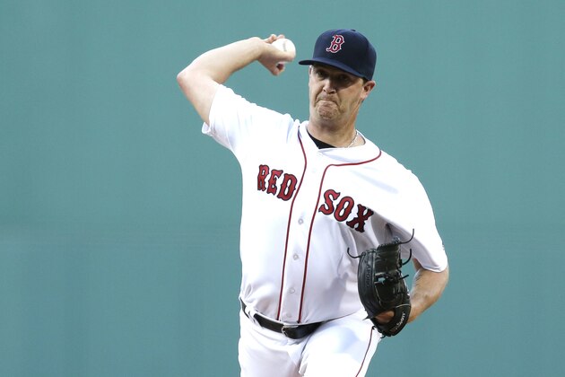 Boston Red Sox starting pitcher Steven Wright delivers during the first inning of a baseball game at Fenway Park, Monday, June 20, 2016, in Boston. (AP Photo/Charles Krupa)
