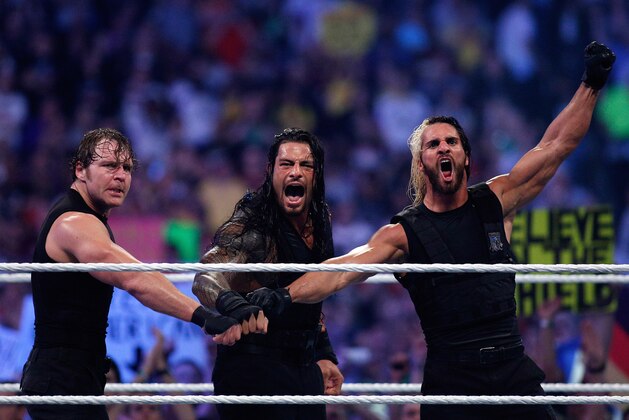 The Shield reacts after their win during Wrestlemania XXX at the Mercedes-Benz Super Dome in New Orleans on Sunday, April 6, 2014. (Jonathan Bachman/AP Images for WWE)
