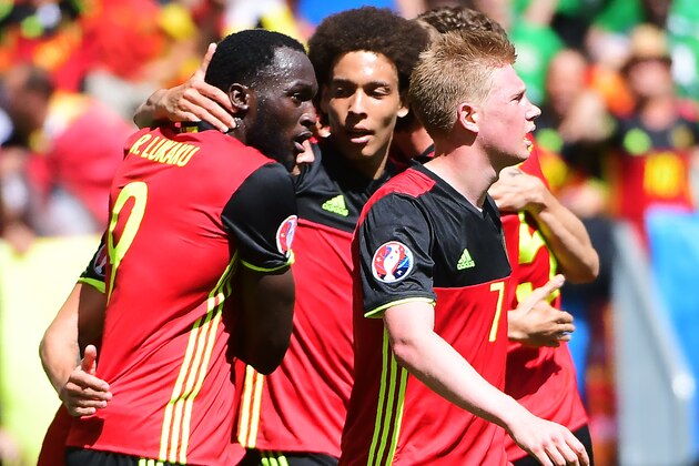 Belgium's forward Romelu Lukaku (L) celebrates with teammates after scoring his team's third goal during the Euro 2016 group E football match between Belgium and Ireland at the Matmut Atlantique stadium in Bordeaux on June 18, 2016. / AFP / EMMANUEL DUNAND        (Photo credit should read EMMANUEL DUNAND/AFP/Getty Images)