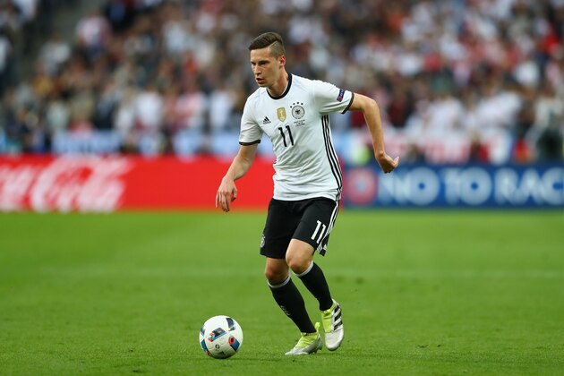PARIS, FRANCE - JUNE 16:  Julian Draxler  of Germany runs with the ball during the UEFA EURO 2016 Group C match between Germany and Poland at Stade de France on June 16, 2016 in Paris, France.  (Photo by Alexander Hassenstein/Getty Images)