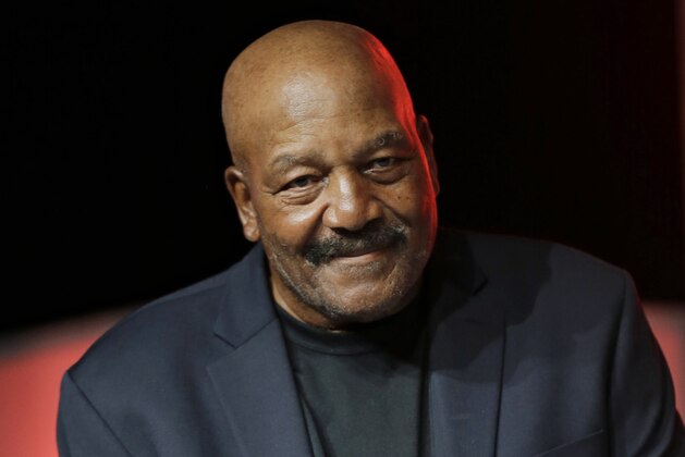 FILE - In this April 4, 2015, file photo, former Cleveland Browns running back Jim Brown is introduced during a press conference in Cleveland. The death of Muhammad Ali last week sent Brown, a four-time NFL MVP, and Kareem Abdul-Jabbar, the NBA's all-time scoring leader, strolling down memory lane, back to June 4, 1967 and a sunny day that they spent together in Cleveland.  (AP Photo/Tony Dejak)