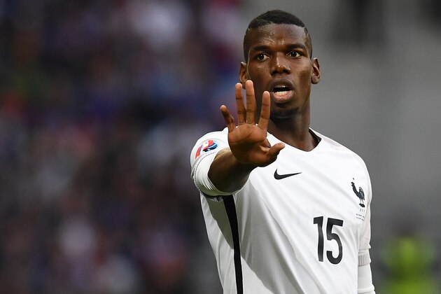 France's midfielder Paul Pogba reacts during the Euro 2016 group A football match between Switzerland and France at the Pierre-Mauroy stadium in Lille on June 19, 2016. / AFP / FRANCK FIFE        (Photo credit should read FRANCK FIFE/AFP/Getty Images)