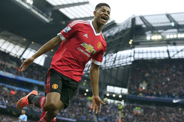 United’s Marcus Rashford celebrates after scoring his side's first goal during the English Premier League soccer match between Manchester City and Manchester United at the Etihad stadium in Manchester, Sunday, March 20, 2016.(AP Photo/Jon Super)