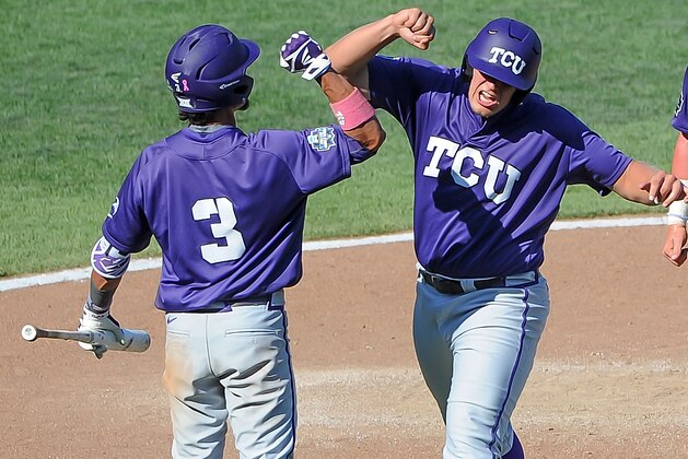 Jun 19, 2016; Omaha, NE, USA; TCU Horned Frogs infielder Luken Baker (19) celebrates with infielder Elliott Barzilli (3) after a ninth inning home run against the Texas Tech Red Raiders in the 2016 College World Series at TD Ameritrade Park. TCU won 5-3. Mandatory Credit: Steven Branscombe-USA TODAY Sports