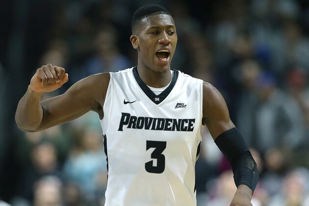 PROVIDENCE, RI - MARCH 2:  Kris Dunn #3 of the Providence Friars celebrates in the second half against the Creighton Bluejays on March 2, 2016, at the Dunkin' Donuts Center in Providence, Rhode Island. (Photo by Jim Rogash/Getty Images)