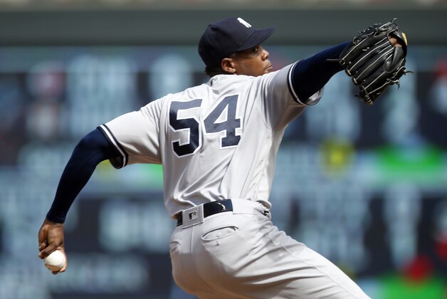 New York Yankees pitcher Aroldis Chapman throws against the Minnesota Twins in the ninth inning of a baseball game Saturday, June 18, 2016, in Minneapolis. (AP Photo/Jim Mone)