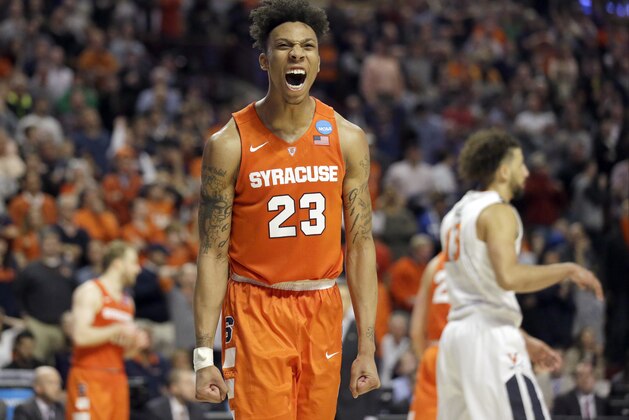 Syracuse's Malachi Richardson (23) reacts during the second half of a college basketball game against Virginia in the regional finals of the NCAA Tournament, Sunday, March 27, 2016, in Chicago. Syracuse won 68-62. (AP Photo/Nam Y. Huh)