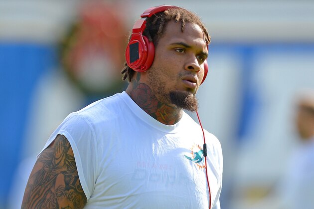 Dec 20, 2015; San Diego, CA, USA; Miami Dolphins center Mike Pouncey (51) warms up prior to the game against the San Diego Chargers at Qualcomm Stadium. Mandatory Credit: Jayne Kamin-Oncea-USA TODAY Sports