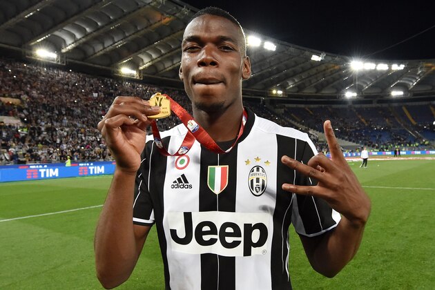 ROME, ITALY - MAY 21:  Paul Pogba of Juventus FC celebrates the victory after the TIM Cup match between AC Milan and Juventus FC at Stadio Olimpico on May 21, 2016 in Rome, Italy.  (Photo by Giuseppe Bellini/Getty Images)