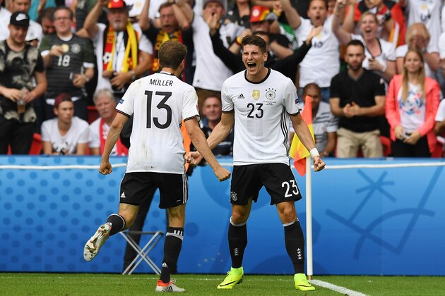 PARIS, FRANCE - JUNE 21: Mario Gomez of Germany celebrates after scoring during the UEFA EURO 2016 Group C match between Northern Ireland and Germany at Parc des Princes on June 21, 2016 in Paris, France. (Photo by Charles McQuillan/Getty Images)