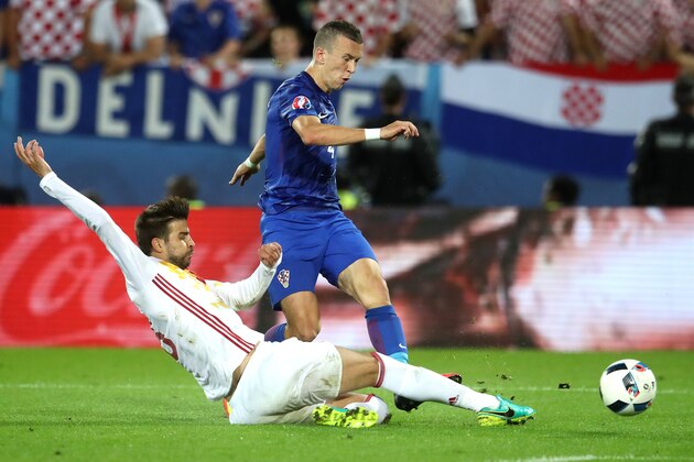 Croatia's Ivan Perisic scores his side's second goal during the Euro 2016 Group D soccer match between Croatia and Spain at the Nouveau Stade in Bordeaux, France, Tuesday, June 21, 2016. (AP Photo/Petr David Josek)