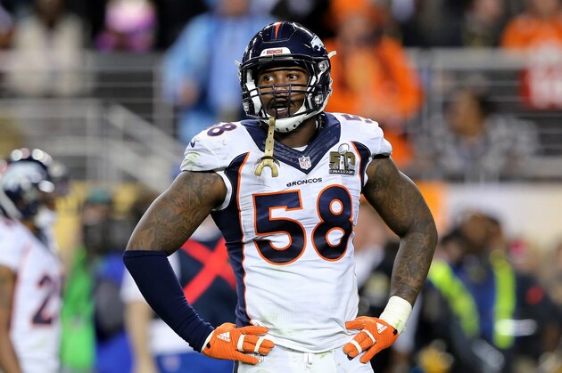 FILE - In this Feb. 7, 2016, file photo, Denver Broncos' Von Miller pauses during NFL football's Super Bowl 50 against the Carolina Panthers in Santa Clara, Calif. Miller, Miami Heat's Dwyane Wade and Chicago Cubs' Jake Arrieta will be featured in ESPN The Magazine's eighth annual