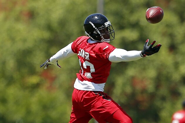Atlanta Falcons wide receiver Mohamed Sanu (12) takes part of a drill during an NFL football practice in Flowery Branch, Ga. Tuesday, June 7, 2016. (AP Photo/Todd Kirkland)