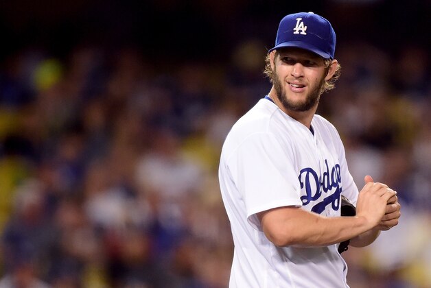 LOS ANGELES, CA - JUNE 20:  Clayton Kershaw #22 of the Los Angeles Dodgers reacts to his wild pitch during the seventh inning against the Washington Nationals at Dodger Stadium on June 20, 2016 in Los Angeles, California.  (Photo by Harry How/Getty Images)