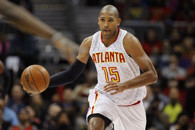 Atlanta Hawks center Al Horford dribbles during the first half of an NBA basketball game against the Chicago Bulls, Friday, Feb. 26, 2016, in Atlanta. (AP Photo/Brett Davis)
