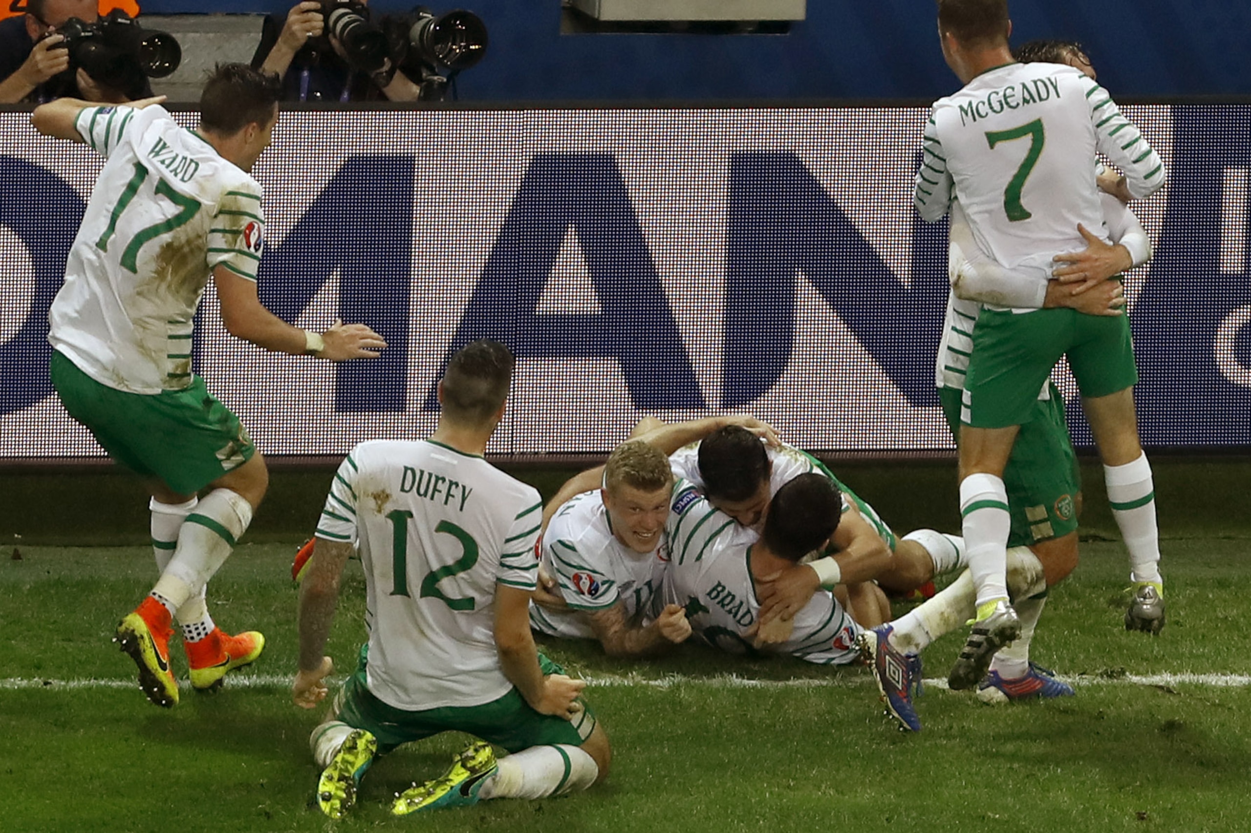 Ireland's Robbie Brady, center, celebrates with team mates after scoring his side's first goal during the Euro 2016 Group E soccer match between Italy and Ireland at the Pierre Mauroy stadium in Villeneuve d’Ascq, near Lille, France, Wednesday, June 22, 2016. (AP Photo/Darko Vojinovic) Ireland's Robbie Brady, center, celebrates with team mates after scoring his side's first goal during the Euro 2016 Group E soccer match between Italy and Ireland at the Pierre Mauroy stadium in Villeneuve d’Ascq, near Lille, France, Wednesday, June 22, 2016. (AP Photo/Darko Vojinovic)