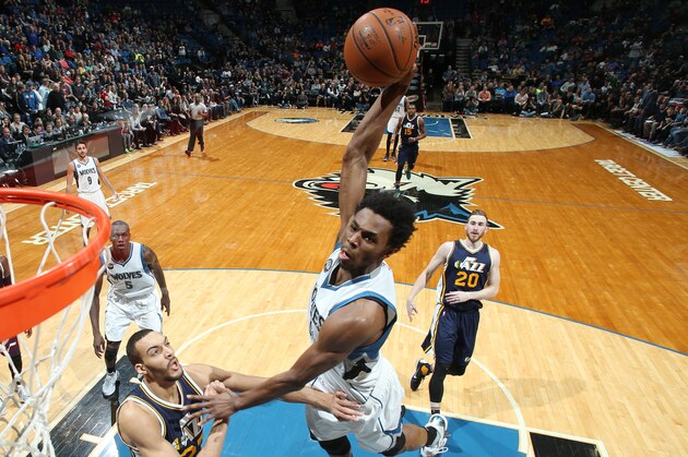 MINNEAPOLIS, MN -  MARCH 26:  Andrew Wiggins #22 of the Minnesota Timberwolves goes up for a dunk against the Utah Jazz on March 26, 2016 at Target Center in Minneapolis, Minnesota. NOTE TO USER: User expressly acknowledges and agrees that, by downloading and or using this Photograph, user is consenting to the terms and conditions of the Getty Images License Agreement. Mandatory Copyright Notice: Copyright 2016 NBAE (Photo by David Sherman/NBAE via Getty Images)