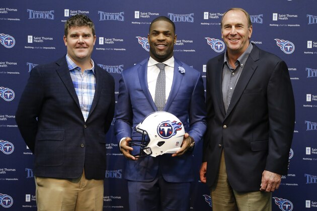 Tennessee Titans running back DeMarco Murray, center, poses with general manager Jon Robinson, left, and head coach Mike Mularkey, right, at a news conference Thursday, March 10, 2016, in Nashville, Tenn. The Titans acquired Murray in a trade with the Philadelphia Eagles. (AP Photo/Mark Humphrey)