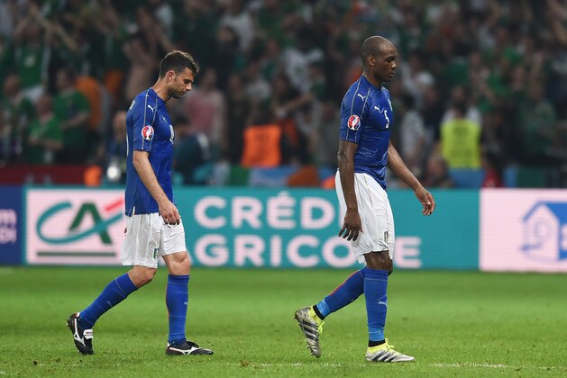 LILLE, FRANCE - JUNE 22: Thiago Motta (L) and Angelo Ogbonna of Italy leave the pitch after their 0-1 defeat in the UEFA EURO 2016 Group E match between Italy and Republic of Ireland at Stade Pierre-Mauroy on June 22, 2016 in Lille, France.  (Photo by Claudio Villa/Getty Images)