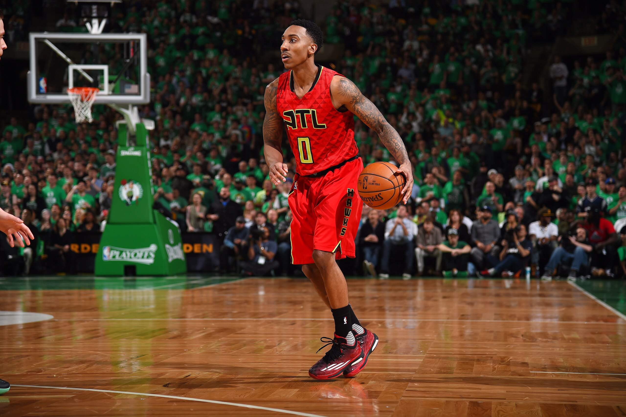 BOSTON, MA - APRIL 28: Jeff Teague #0 of the Atlanta Hawks handles the ball during the game against the Boston Celtics in Game Six of the Eastern Conference Quarterfinals during the 2016 NBA Playoffs on April 28, 2016 at TD Garden in Boston, Massachusetts. NOTE TO USER: User expressly acknowledges and agrees that, by downloading and or using this Photograph, user is consenting to the terms and conditions of the Getty Images License Agreement. Mandatory Copyright Notice: Copyright 2016 NBAE (Photo by Brian Babineau/NBAE via Getty Images)
