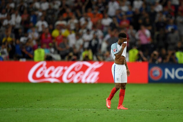 England's midfielder Raheem Sterling reacts at the end of the Euro 2016 group B football match between England and Russia at the Stade Velodrome in Marseille on June 11, 2016. / AFP / PAUL ELLIS        (Photo credit should read PAUL ELLIS/AFP/Getty Images)